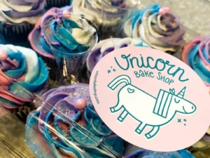 Logo and colorful cupcakes