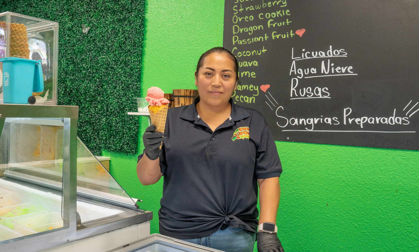 Sweet D'Licias owner holding an ice cream.